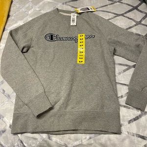 Mens Champion sweater size small never worn with tags. Bought at Costco